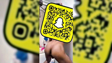 Tanned babe's juicy ass with pink anal plug stuffed in tight asshole on Snapchat.