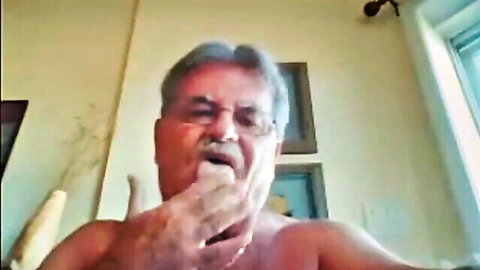 Shirtless mature uncle with gray hair showing off in amateur video