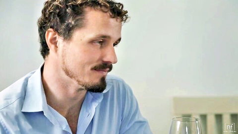 Robby Echo in light blue shirt, close-up from NubileFilms couple video