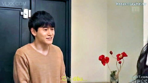 Handsome Asian man smiling at mysterious woman by door