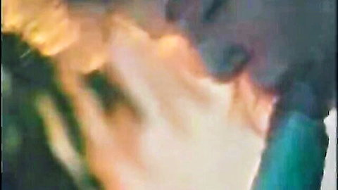 Blurry taboo milf embrace: blonde and brunette in intimate pose