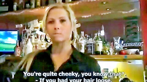 Blonde Czech Veronika flirting cheekily behind bar in Czech Streets