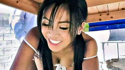 Petite Asian babe smiling while sucking BBC stepdad cock