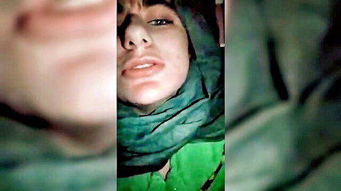 Turkish woman in green hijab, seductive close-up selfie