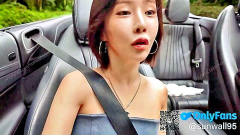 Little Caprice in off-shoulder top, teasing smile from luxury car seat