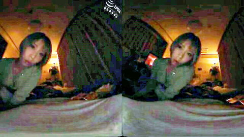 Cute Asian Japanese babe in green top lying on bed teasing with red dildo POV VR