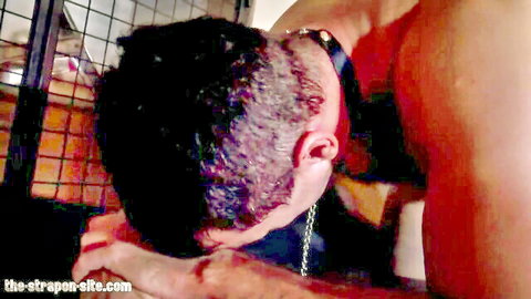 Mistress Tatjana pegging submissive man's ass hard in BDSM scene