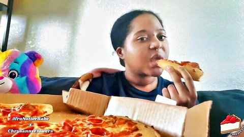 Curvy black woman devouring pizza in steamy mukbang porn