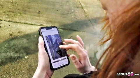 Glasses ginger redhead MILF Mona Einhorny on phone at outdoor casting
