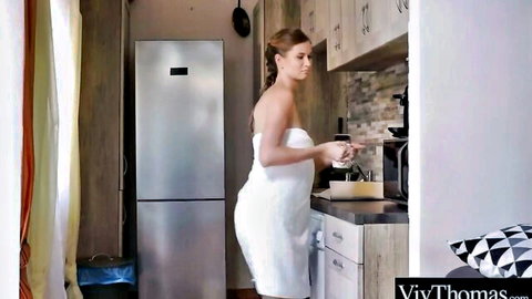 Busty brunette MILF Naomi Cruise in white dress posing seductively