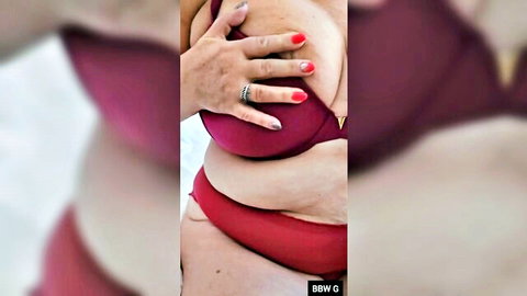 Chunky 60yo curly granny BBW in red bikini cupping breasts