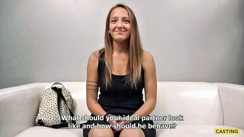 Czech beauty in black tank top smiles during casting interview on ideal partner