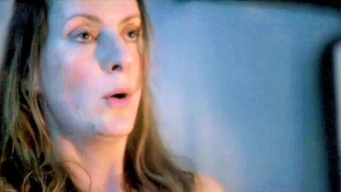 Closeup of sexy mature brunette with open mouth and green eyes gasping sensually