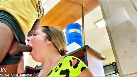 Blonde woman with ponytail deepthroating big black cock in kitchen near water cooler