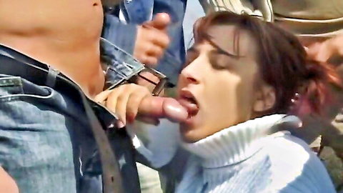 Redhead in turtleneck gives deepthroat blowjob in gangbang