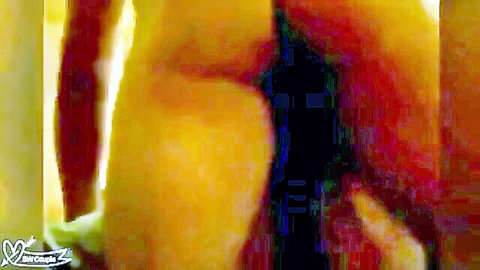 Blurry close-up of curvy woman's big ass in black stockings, hand touching