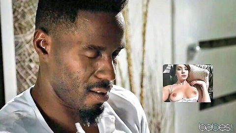 Intense black bull close-up with bearded face as busty topless babe exposes big tits in interracial scene