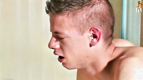 Young white twink with spiky hair moaning mouth open shirtless in shower