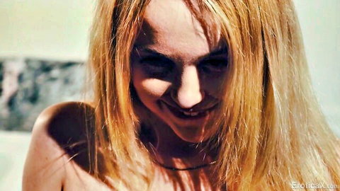 Nikole Nash blonde smiling topless close-up tease