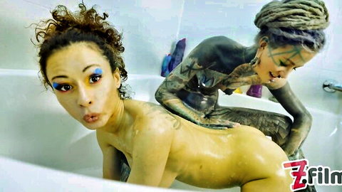 Anuskatzz and Stacy Bloom in wet lesbian bath fisting and gape