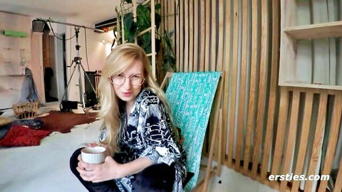 Blonde amateur in glasses relaxing with coffee, Ersties first time lesbians preview