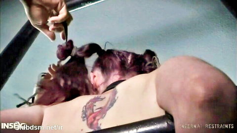 Teen in black pantyhose dominated by man in BDSM restraints