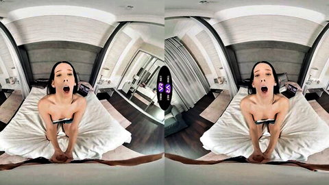 Jasmine Jae nude in VR, mouth agape on bed