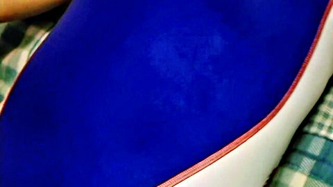 Jun Ariga's hips in tight blue velvety bodysuit, seductive close-up