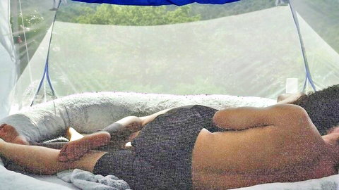 Dick and Janet cuddling in a lazy morning embrace