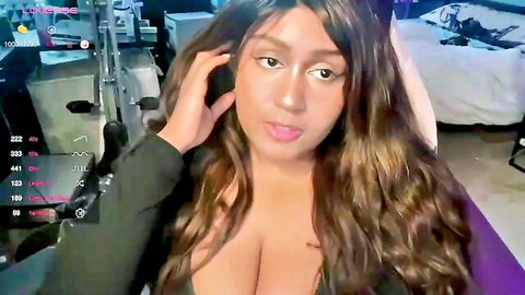 Curvy ebony BBW webcam babe with huge natural tits teasing massive cleavage