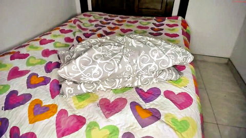 Strawberryshan in amateur Chaturbate bedroom setup on colorful heart bed