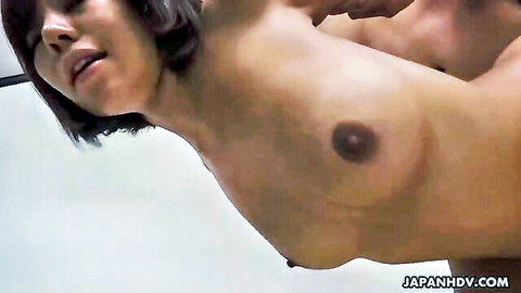 Japanese brunette with big tits in intimate bed scene with lover