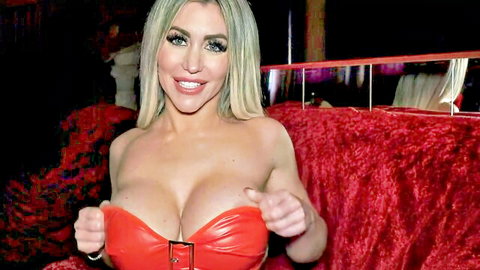 Carla Boom shakes massive tits in red bustier, teasing pose