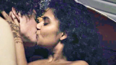 Topless South Asian beauty with medium tits passionately kissing tattooed muscular guy
