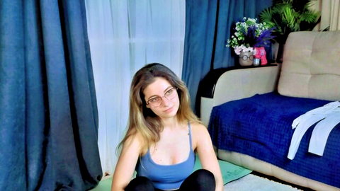 Lelahcaminero cute young cam girl with small tits in blue tank top, smiling