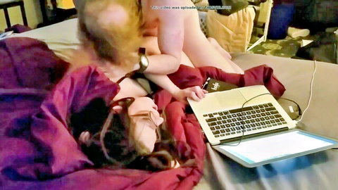 Amateur couple spooning sex on bed with brunette watching laptop porn in sunglasses