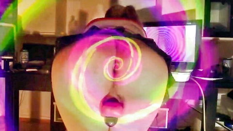 Amateur webcam sissy bends over desk with glowing pink butt plug inserted in tight asshole