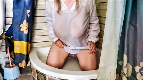 Busty granny MariaOld peeing in wet transparent shirt, solo urine play