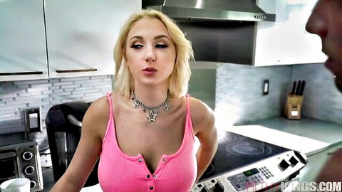 Skylar Vox blonde in pink tank top showing cleavage in kitchen tease