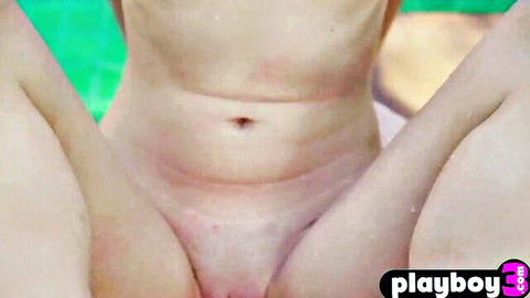 Beautiful all-natural mommy posing nude outdoors, legs spread by pool