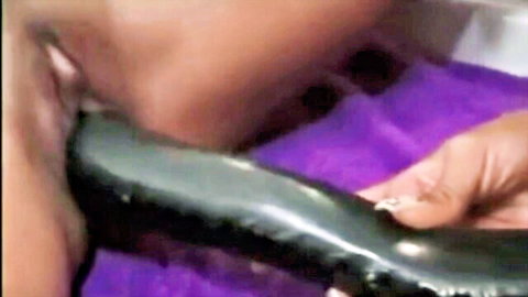 Dee Baker in vintage lesbian dildo penetration closeup