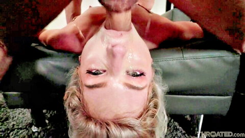 Blonde girl deepthroats thick cock upside down on couch with saliva dripping from POV