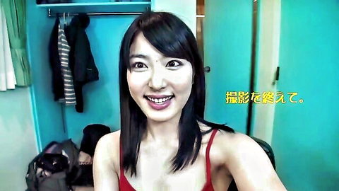 Kana Yume smiling seductively in red tank top, 3rd anniversary facial release