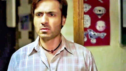 Surprised Indian man in plaid shirt from cuckold adult web series