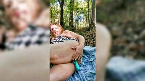 Curvy MILF inserts teal vibrator in bushy wet pussy on forest blanket