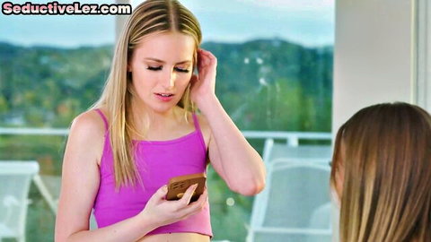 Blonde in pink top and brunette dyke intimately chatting before fingering wet pussies