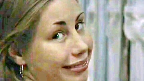 Smiling blonde woman in close-up, from A Girl Watchers Paradise