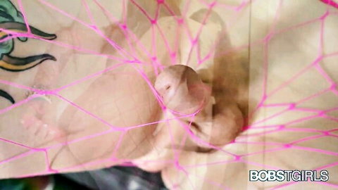 Autumn Rain explicit penis in pink fishnet close-up