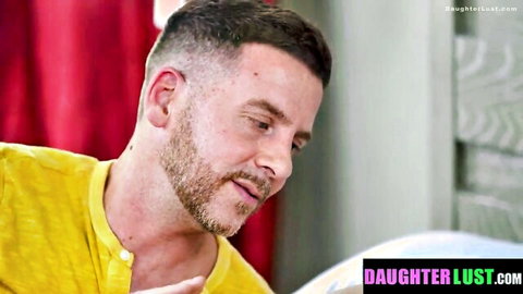 Stepdad in yellow shirt cuddles close with stepdaughter in intimate taboo scene
