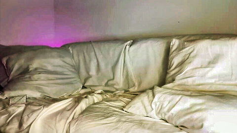 Baby Maddy's cute shy tease on rumpled bed in new Chaturbate video